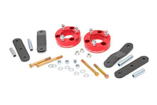 Load image into Gallery viewer, 2.5 Inch Leveling Kit | Red Spacers | Nissan Frontier (05-23)/Xterra (05-15) Rough Country
