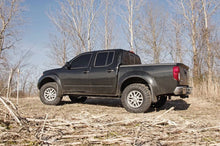 Load image into Gallery viewer, 2.5 Inch Leveling Kit | Red Spacers | Nissan Frontier (05-23)/Xterra (05-15) Rough Country