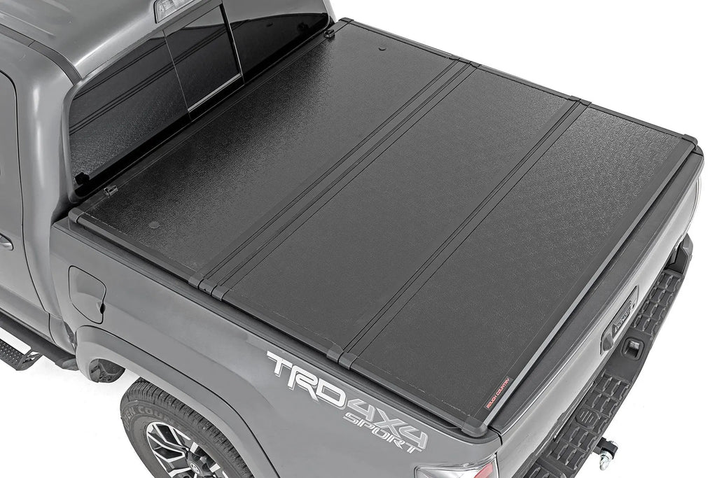 Hard Folding Bed Cover | 5' Bed | Toyota Tacoma 2WD/4WD (16-23) Rough Country