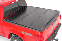 Load image into Gallery viewer, Hard Folding Bed Cover | 5'7" Bed | Ford F-150/F-150 Lightning/Raptor (15-23) Rough Country