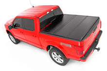 Load image into Gallery viewer, Hard Folding Bed Cover | 5'7" Bed | Ford F-150/F-150 Lightning/Raptor (15-23) Rough Country
