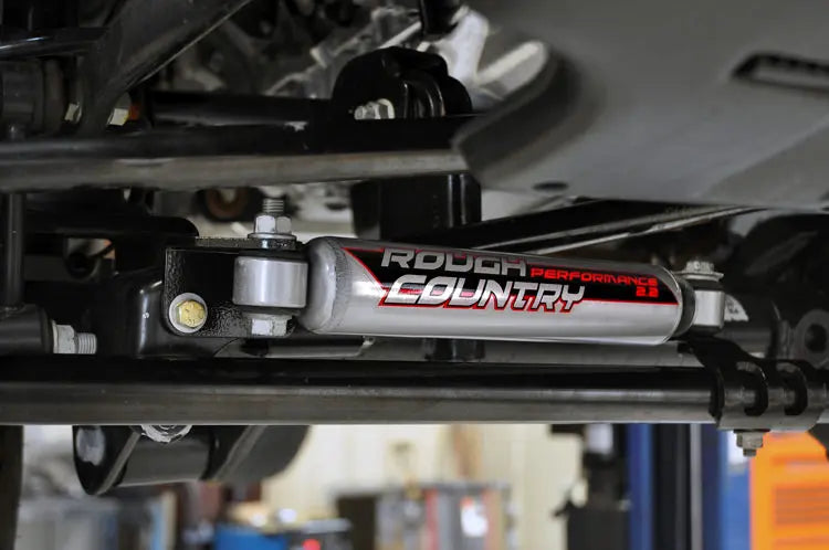 Steering Stabilizer Relocation Bracket | Jeep Wrangler JK  (07-18) Rough Country