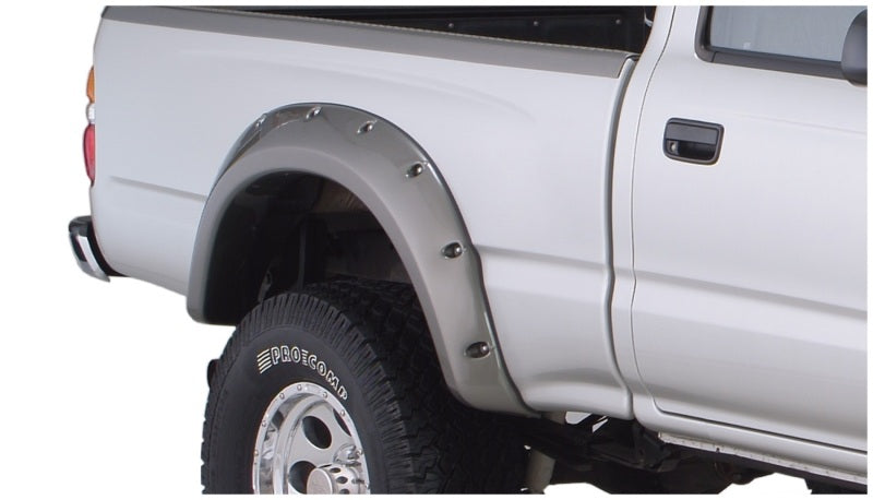Bushwacker 95-04 Toyota Tacoma Fleetside Cutout Style Flares 4pc 74.5in Bed w/ 4WD Only - Black Bushwacker