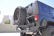 Load image into Gallery viewer, DV8 Offroad 07-18 Jeep Wrangler JK Rear Aluminum Bumper w/ Tire Carrier - Black DV8 Offroad