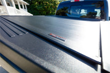 Load image into Gallery viewer, Roll-N-Lock 17-19 Ford F-250/F-350 Super Duty 80-3/8in E-Series Retractable Tonneau Cover Roll-N-Lock