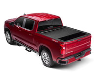 Load image into Gallery viewer, Roll-N-Lock 2020 Chevy Silverado / GMC Sierra 2500-3500 80-1/2in M-Series Retractable Tonneau Cover Roll-N-Lock