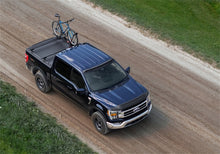 Load image into Gallery viewer, Roll-N-Lock 21-22 Ford F150 (w/o OE Cargo Tracks - 67.1in Bed) E-Series XT Retractable Tonneau Cover Roll-N-Lock