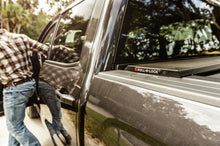 Load image into Gallery viewer, Roll-N-Lock 17-19 Ford F-250/F-350 Super Duty SB 80-3/8in A-Series Retractable Tonneau Cover Roll-N-Lock