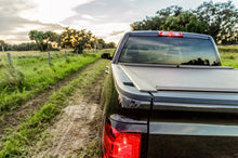 Load image into Gallery viewer, Roll-N-Lock 10-17 Dodge Ram 1500/2500/3500 SB 76in A-Series Retractable Tonneau Cover Roll-N-Lock