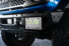 Load image into Gallery viewer, DV8 Offroad 21-22 Ford Bronco Factory Front Bumper License Relocation Bracket - Side DV8 Offroad