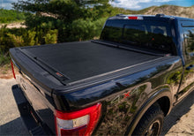 Load image into Gallery viewer, Roll-N-Lock 16-18 Toyota Tacoma Access Cab/Double Cab LB 73-11/16in M-Series Tonneau Cover Roll-N-Lock