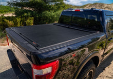 Load image into Gallery viewer, Roll-N-Lock 15-18 Chevy Silverado/Sierra 2500/3500 LB 96-3/8in M-Series Retractable Tonneau Cover Roll-N-Lock