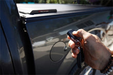 Load image into Gallery viewer, Roll-N-Lock 17-19 Ford F-250/F-350 Super Duty 80-3/8in E-Series Retractable Tonneau Cover Roll-N-Lock