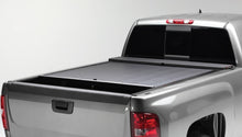 Load image into Gallery viewer, Roll-N-Lock 2020 Chevy Silverado / GMC Sierra 2500-3500 80-1/2in M-Series Retractable Tonneau Cover Roll-N-Lock