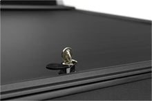 Load image into Gallery viewer, Roll-N-Lock 10-17 Dodge Ram 1500/2500/3500 SB 76in A-Series Retractable Tonneau Cover Roll-N-Lock