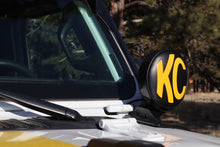 Load image into Gallery viewer, KC HiLiTES 6in. Round Soft Cover (Pair) - Black w/Yellow KC Logo KC HiLiTES