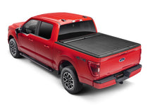 Load image into Gallery viewer, Roll-N-Lock 19-22 RAM 1500 (w/o Swing Gate - 67.4in. Bed) M-Series XT Retractable Tonneau Cover Roll-N-Lock