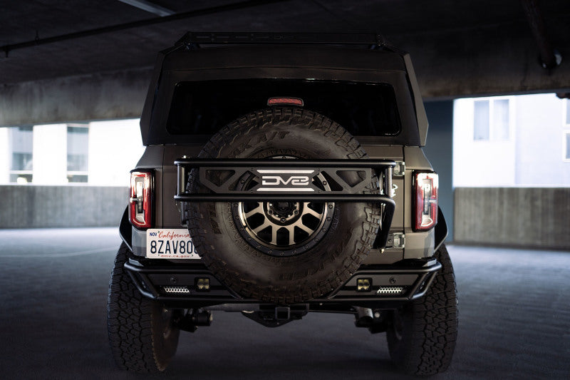 DV8 Offroad 21-23 Ford Bronco Spare Tire Guard & Accessory Mount DV8 Offroad