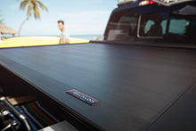Load image into Gallery viewer, Roll-N-Lock 17-19 Ford F-250/F-350 Super Duty 80-3/8in E-Series Retractable Tonneau Cover Roll-N-Lock