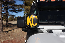 Load image into Gallery viewer, KC HiLiTES 6in. Round Soft Cover (Pair) - Black w/Yellow KC Logo KC HiLiTES