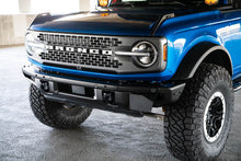 Load image into Gallery viewer, DV8 Offroad 21-22 Ford Bronco Factory Front Bumper License Relocation Bracket - Side DV8 Offroad