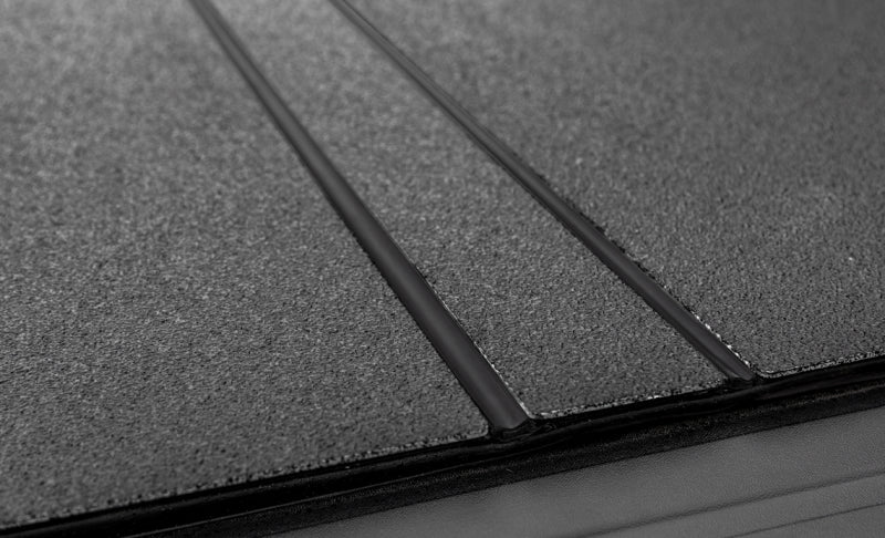 Access LOMAX Tri-Fold Cover Black Urethane Finish 19+ Ford Ranger - 5ft Bed Access