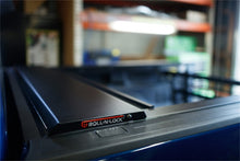 Load image into Gallery viewer, Roll-N-Lock 2019 Ram 1500 XSB 65.5in E-Series Retractable Tonneau Cover Roll-N-Lock