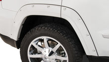 Load image into Gallery viewer, Bushwacker 11-18 Jeep Grand Cherokee Pocket Style Flares 4pc Does Not Fit SRT8 - Black Bushwacker