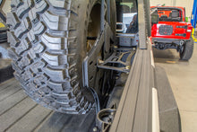 Load image into Gallery viewer, DV8 Offroad 2019+ Jeep Gladiator Universal Stand Up In-Bed Tire Carrier DV8 Offroad
