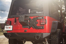 Load image into Gallery viewer, Rugged Ridge Spartacus HD Tire Carrier Whl Mount 87-06 YJ/TJ Rugged Ridge