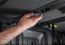 Load image into Gallery viewer, Extang 21-23 Ford F-150 (5ft. 7in. Bed) Solid Fold ALX Extang