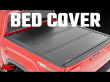 Load image into Gallery viewer, Hard Low Profile Bed Cover | 5'7" Bed | Cargo Mgmt | Toyota Tundra (22-23) Rough Country