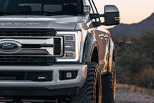 Load image into Gallery viewer, Defender Pocket Fender Flares | UX Ingot Silver Metallic | Ford Super Duty (17-22) Rough Country